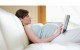 pregnant mom reading in bed